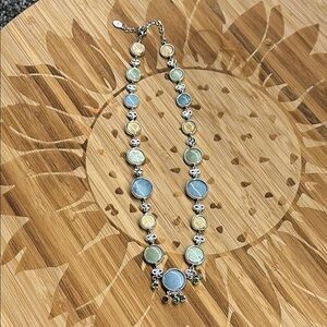 Elegant Silver and Blue Necklace with Flowing Design